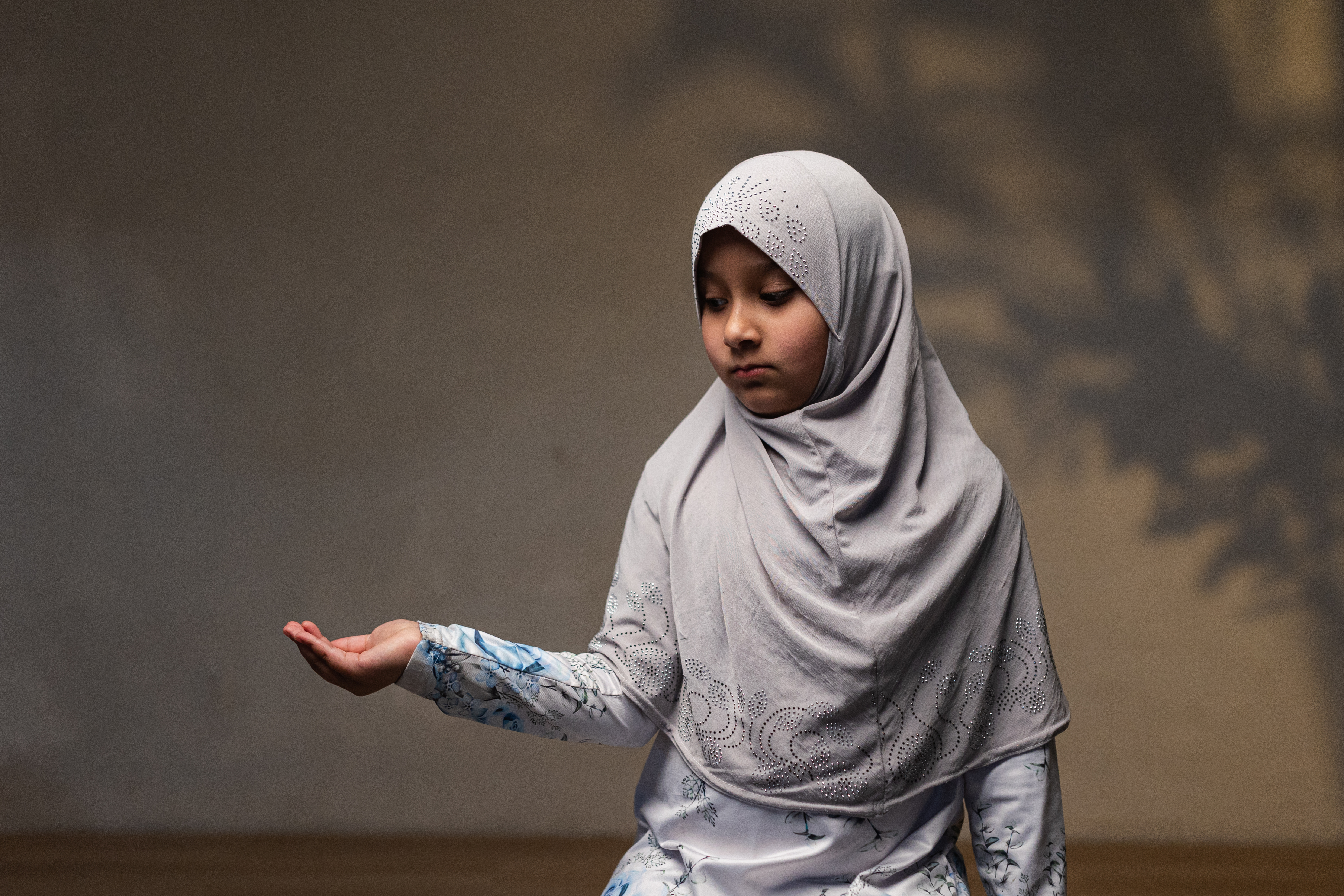 A child reaching for clean water