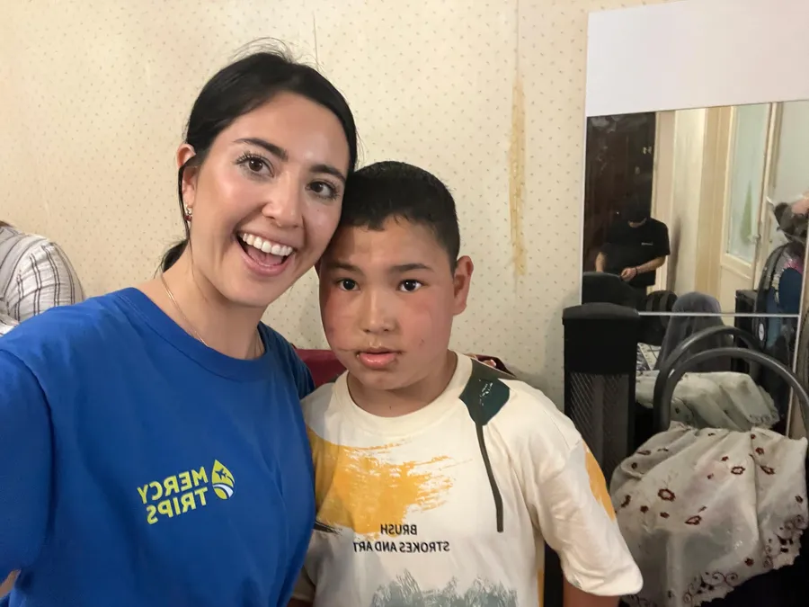 Mercy Trips volunteer with a Uyghur orphan in Istanbul